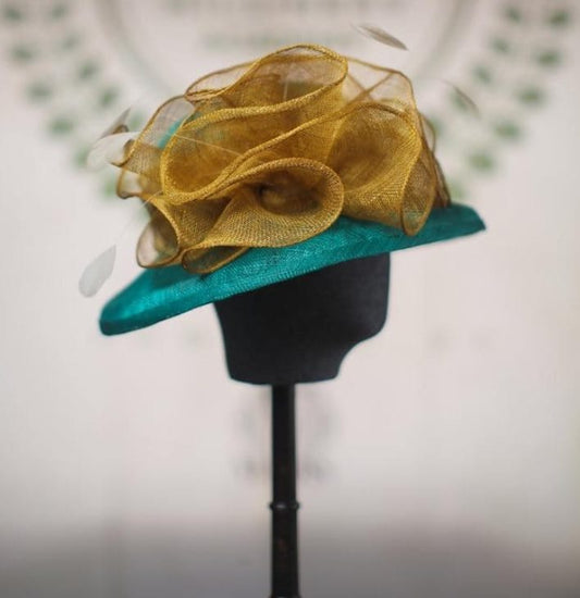 Flora Kiki Fiadjoe Green And Gold Hat Check Out Our Hand Made Green And Gold Hat Which Adds Up To Your Heigh